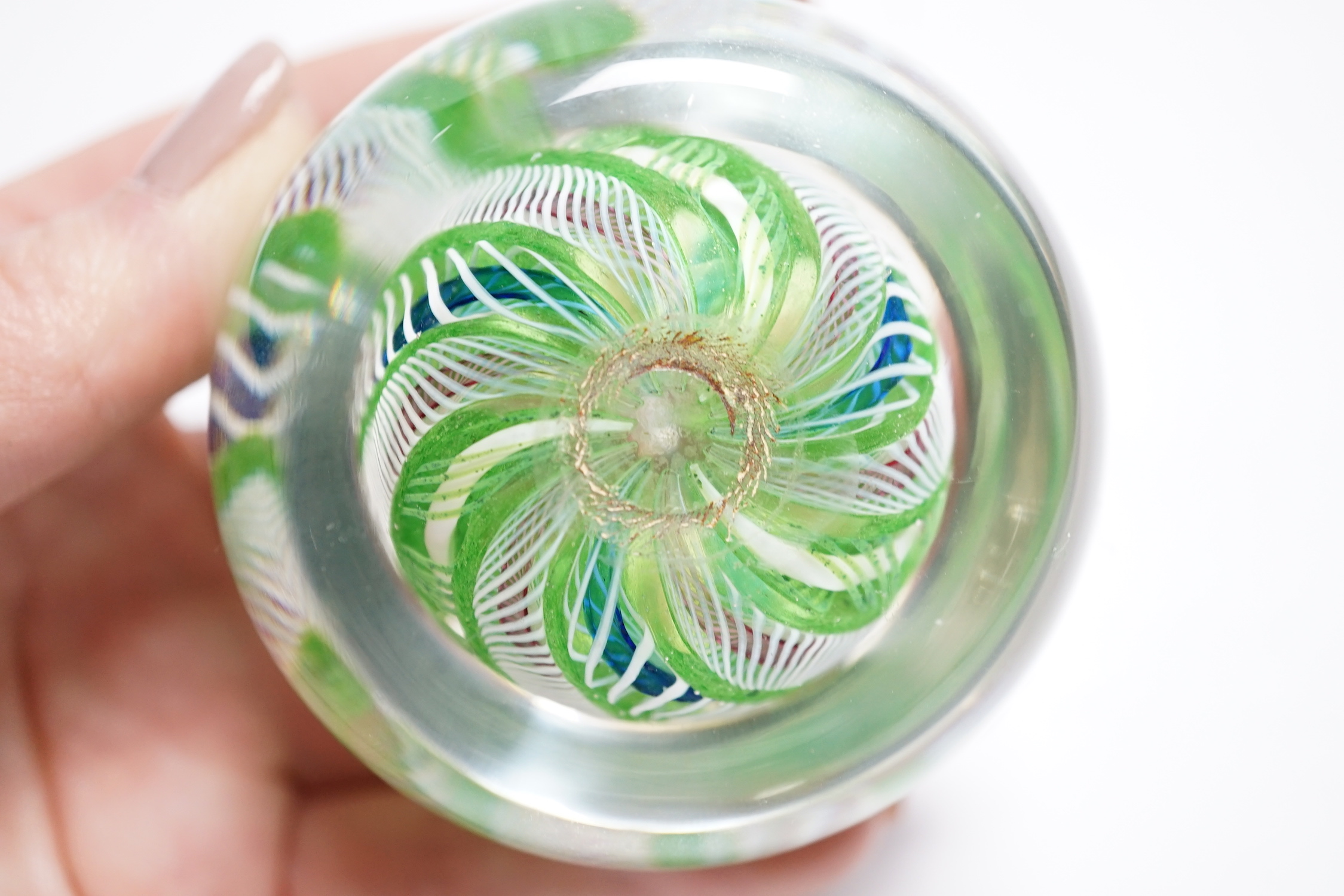 A Paul Ysart latticino swirl crown paperweight, polished concave base, Caithness period, 6.5cm